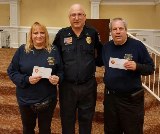 Three members of the Bucks Fire Police posing for a picture